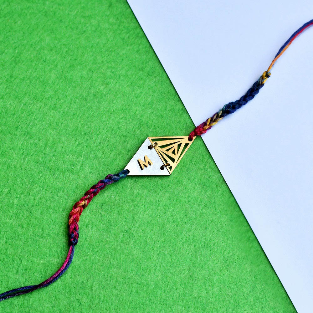 Two triangle personalised rakhi with Roli Chawal