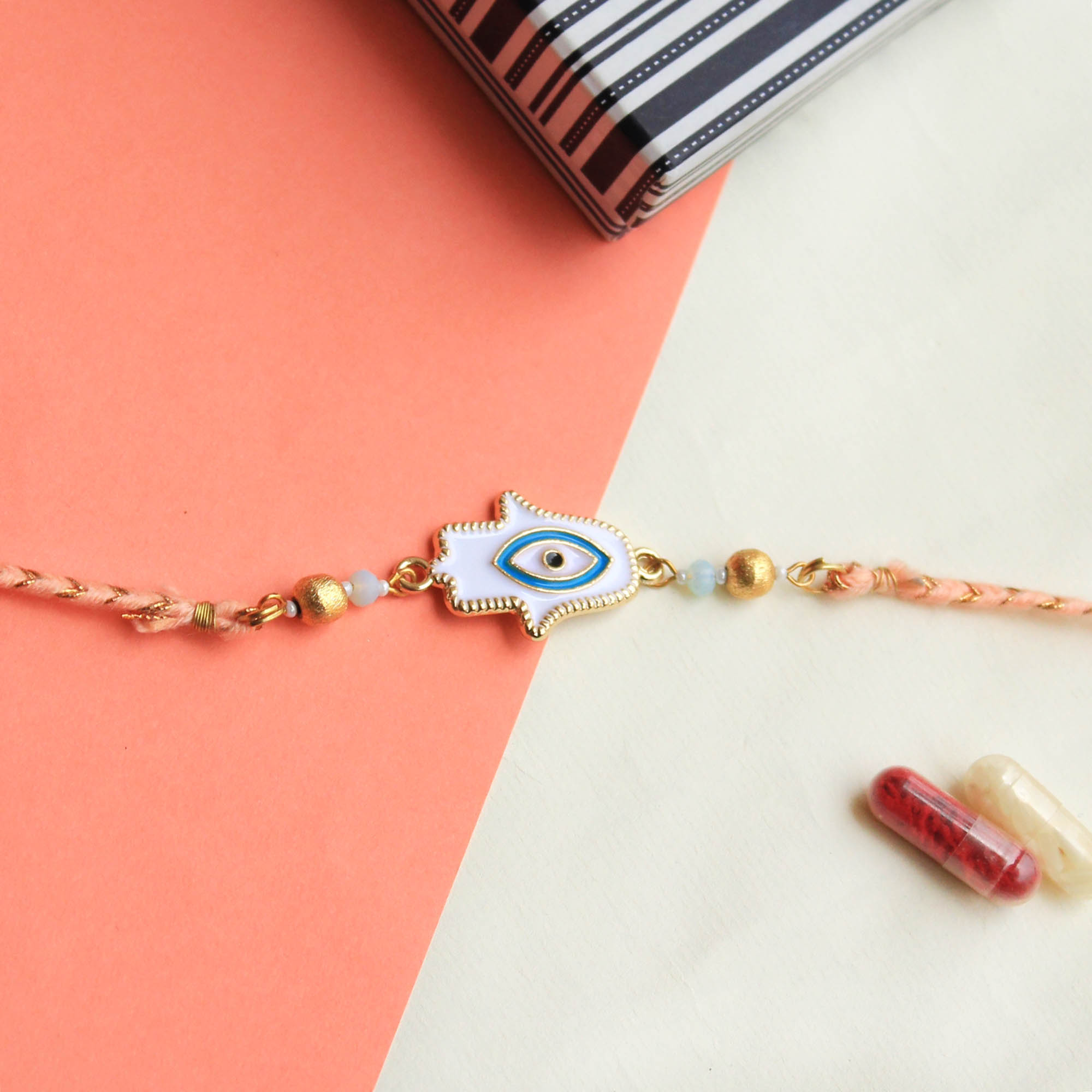 HAMSA Evil Eye Rakhi with Roli Chawal